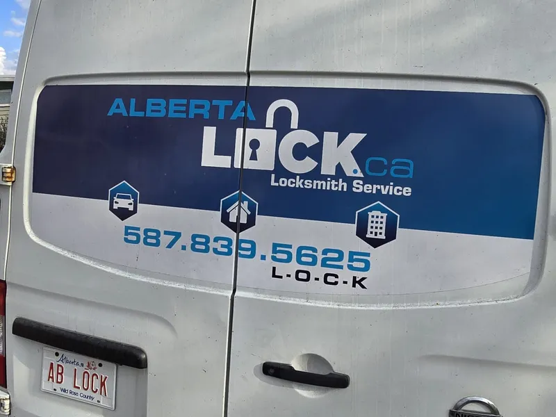 Alberta Lock Nissan NV2500 service van from the rear
