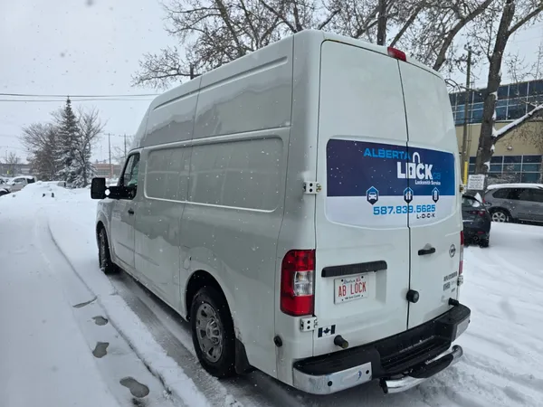 Alberta Lock service van rear in a snowy lot
