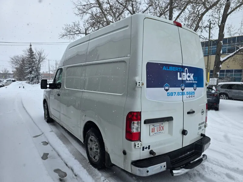 Alberta Lock service van rear in a snowy lot