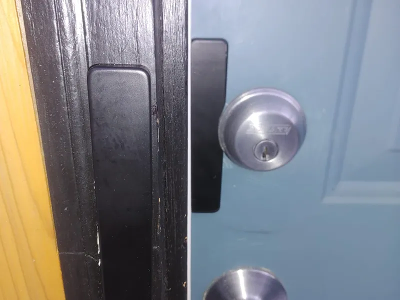 Blue door with Schlage deadbolt installed at the jamb edge
