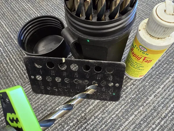 Drill bit set and rapid tap cutting fluid