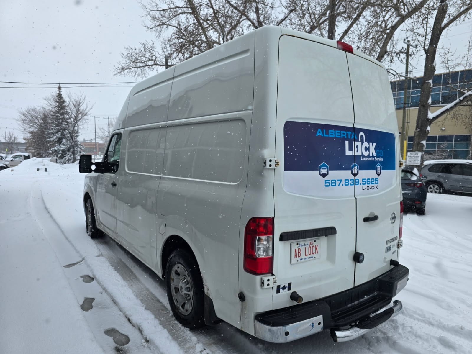 Alberta Lock service van rear in a snowy lot